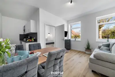 Image de Ferienwohnung Strandläufer - Stand- und Ostseenah, Duschbad, Modern, Terrasse