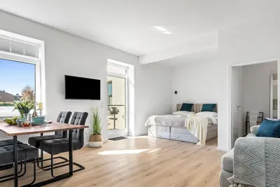 Image de Ferienwohnung Strandzeit - Ostsee- und Strandnah, Modern, Terrasse, Duschbad