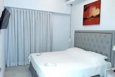 Suite with Partial Side Sea View - Cavo Seaside Suites