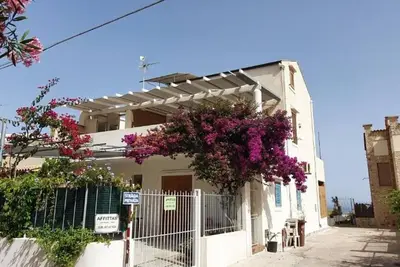 Image de Maison de vacances 'Appartamento Bouganville' avec terrasse privée et Wi-Fi