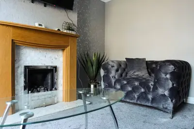 Image de Cozy 7bed home - 10mins from town centre!