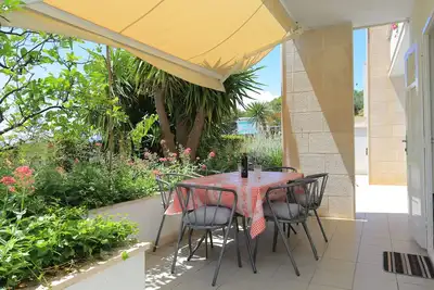 Image de Appartement de trois chambres avec la terrasse et la vue sur le mer Brela, Makarska (A-20598-a)