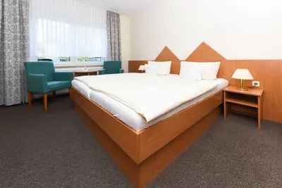 Image de Double room Spiekeroog - Pension Nordkap in Bensersiel