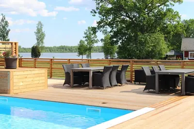 Image de Comfort holiday home with lake location, motor boat and pool