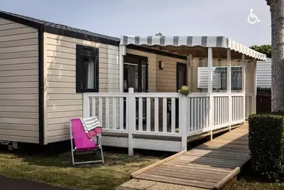 Image de Mobilheim Pmr Großer Komfort 30 m2/ 2 Schlafzimmer - überdachte Terrasse 5 bis 6 Personen - 5 Pers. im Preis enthalten