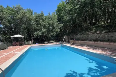 Image de suite apartment in residence with swimming pool in the Tuscan countryside.