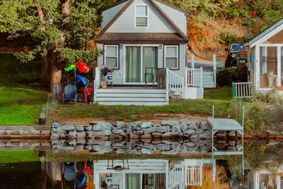 Image de Lakefront; view of ski mountain, firepit, dock, kayaks, paddle board