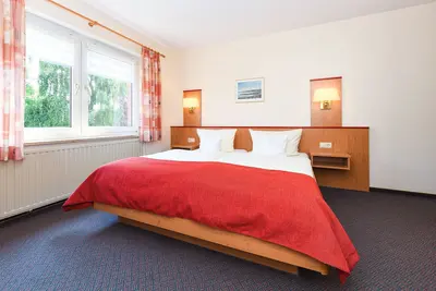 Image de Doppelzimmer Borkum - Pension Nordkap in Bensersiel