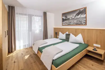 Image de Zum Sonnentor - Appartement Larix 2' avec vue sur les montagnes, balcon et Wi-Fi