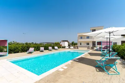 Image de Appartement de vacances \"Le Scuderie 3\" avec piscine partagée, terrasse partagée et Wi-Fi