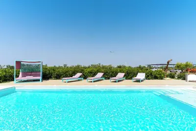 Image de Appartement de vacances \"Le Scuderie 1\" avec piscine partagée, terrasse partagée et Wi-Fi