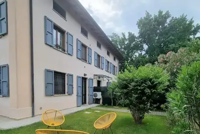 Image de Wonderful apartment with garden and private parking in strategic location