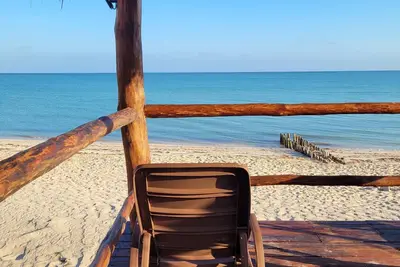 Image de Pasilla suite. Ocean view glass doors to the turquoise water, 13foot Tv screen