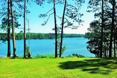 Image de 2015 Built Lakeshore Cabin with 220 of shoreline, sandy beach on 8 private acres