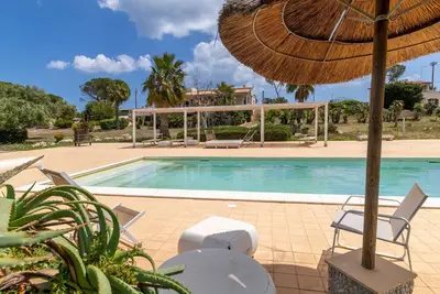 Image de Villa 'Bianca Tra Isola E Plemmirio' avec vue sur la mer, piscine partagée et climatisation