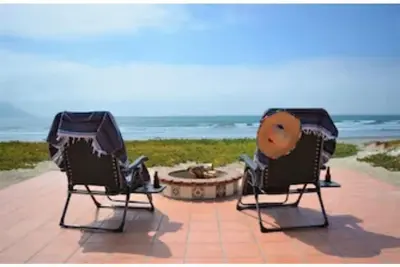 Image de Searenity   Keep an eye on kids. You:  on patio with a refreshing beverage.