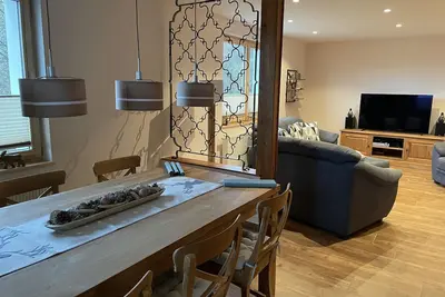 Image de High-quality furnished vacation home for up to 7 people. Three bedrooms with double beds and a cozy sofa bed incl. sleeping function await you.