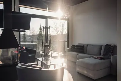 Image de Loft de luxe dans une station touristique avec magnifique vue sur golf montagnes