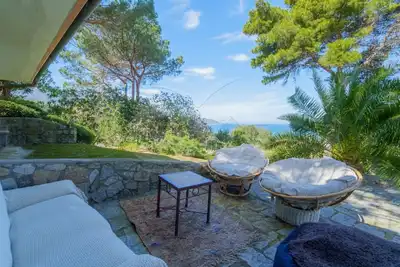 Image de Villa Il Cappero immersed in the greenery of well-kept gardens with an incredible view of the Gulf,