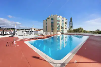 Image de Appartement de vacances 'House Amendoeiras' avec piscine partagée, jardin partagé et Wi-Fi