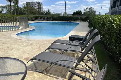 Image de 10Min. Del Aeropuerto apt. picina aire wifi 24h seguridad patio de juegos parqueo
