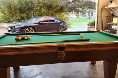 Image de 11 Beds, Billiards, Hot Tub, Mins From Dt & 6th