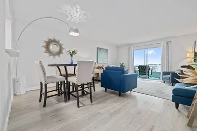 Waterfront Condo w/ Heated Pool, Pier & Sunset Views – Walk to Dunedin Causeway & Honeymoon Island!