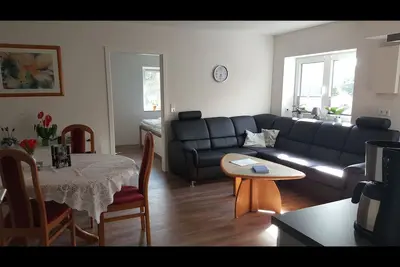 Image de Chic vacation home, nestled in the beautiful Schleil landscape, 53 square meters of living space, for up to 4 people plus toddler. Facilities: Baby crib, beautiful garden area with play facilities and covered barbecue and smoking area, fly screens. . .