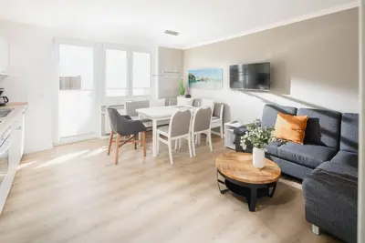 Image de The vacation apartment \"Goode Wind\" is located in the house \"Frisia 23\".