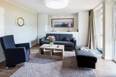 Image de The vacation apartment \"Wattwunder\" is located in the street \"Südwesthörn\", not far from the We