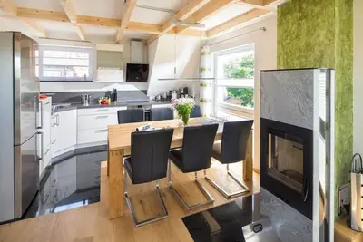 Image de The \"Hus op Eck\" vacation apartment is located in the quieter residential area along