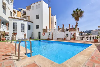 Image de Appartement \"Apartamento Alcazar\" avec vue sur les montagnes, piscine partagée et Wi-Fi