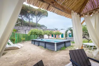 Blue shell villa a stone's throw from the sea