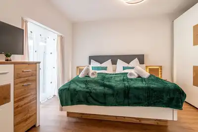 Image de Confortable appartement pour 4 personnes avec bain Ă remous, Wifi, Tv, terrasse et parking