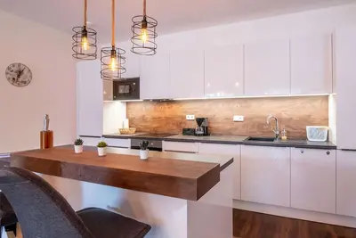 Image de Joli appartement pour 5 personnes avec bain Ă remous, Wifi, Tv, terrasse, animaux admis et parking