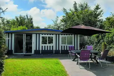 Spacious caravan with fixed awning and sheltered garden