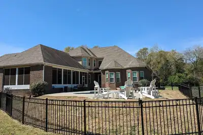 Image de Masters Home Rental - 5 Bed/5 Bath w/Pool, Theater