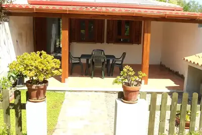 Image de Studio apartment with patio in front and back terrace with veranda