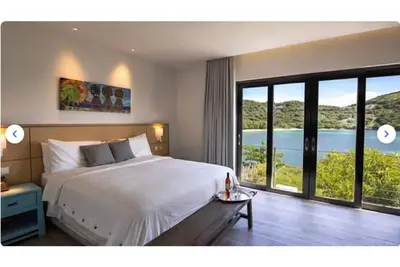 Image de The view is superb! Just steps away from the pool. . . and the sea.