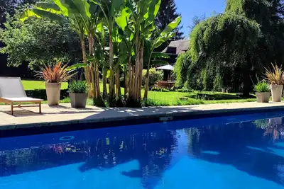 Image de Maison normande au parc majestueux avec piscine chauffée