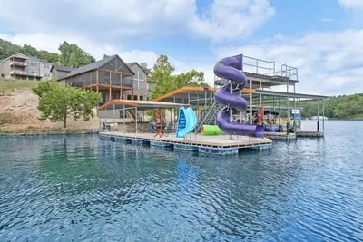 Image de Luxury Home on Cove with Boat Slips, Waterslides, and Jump Deck