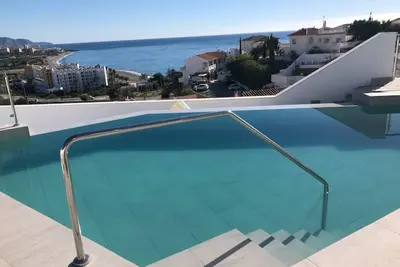 Image de Detached Modern Villa + Infinity Pool opposite the beach. Best views in Nerja!