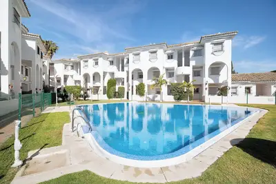 Image de Appartement 'Costa Sancti Petri' avec piscine partagée, Wi-Fi et climatisation