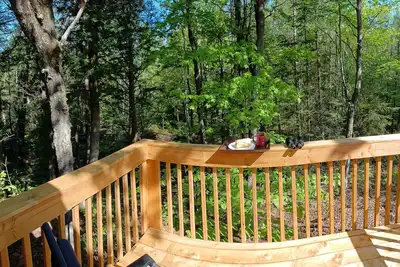 Image de Le petit cottage du grand boisé - avec spa extérieur chauffé au bois.