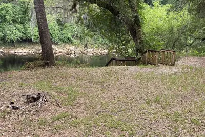 Campsite is locate on the suwannee river. Has power, water and Rv hook up!