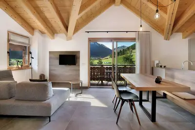 Image de Appartement 'Botton D'oro Camping Stella Alpina' avec vue sur la montagne, jardin partagé et Wi-Fi