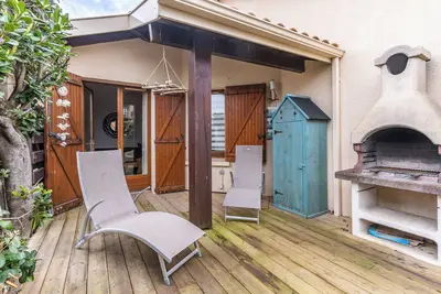 Image de Maison de vacances 'Maisonnette Biscarosse' avec terrasse privée et Wi-Fi