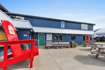 Gorgeous Downtown Penthouse with 40' Waterfront Deck Overlooking Kalamazoo River & Mt. Baldhead! 3br 2ba (Upper Level Unit)