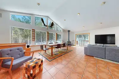 Image de Dog-friendly home with large deck, hot tub, woodstove, W/D, & serene setting