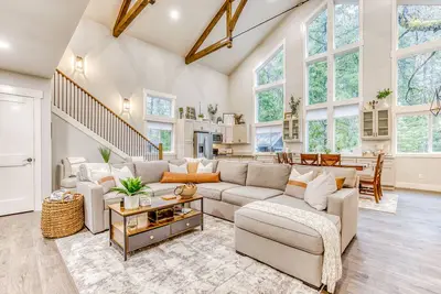 Inviting home with fireplace, sauna, full kitchen, & W/D